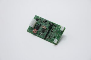 GO-IMD insulation monitoring device, green PCB with white connectors and DIP-switch config